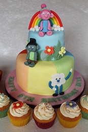 trolls birthday cake and cupcakes